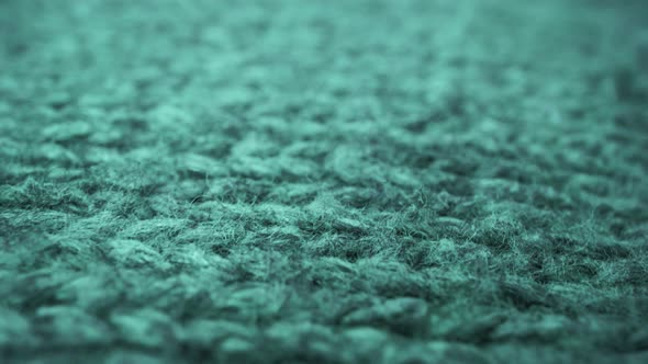 Extreme Detail View of Sheep Wool Cloth Texture Flowing in Macro Dolly Shot