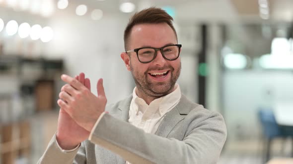 Excited Creative Man Clapping, Applauding