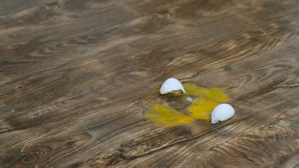 Falling and Breaking an Egg on Laminate