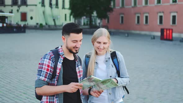 Tourists with Map Looking for New Historical Place in City Center