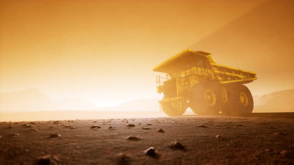 Big Yellow Mining Truck in the Dust at Career