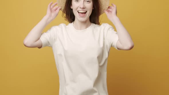 Casul Woman Smiling and She Sit Happy Jumps Up and Joy on Yellow Background