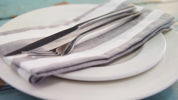 Various cutlery on wooden table 4k