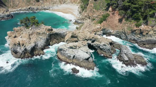 Sea Cliffs in Deep Blue Waters Stormy Beach and Cliffs Aerials Pacific Ocean