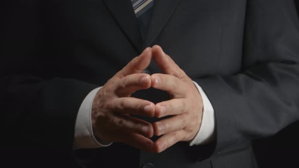 Businessman gestures in a discuss