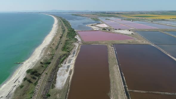 Amazing drone aerial landscape of the beautiful salt ponds, near the beach