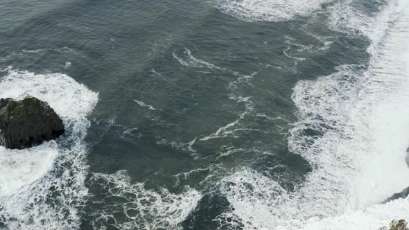 Aerial View of Iconic Black Sand Beach Around Reynisfjara Beach and Dyrholaey Lighthouse