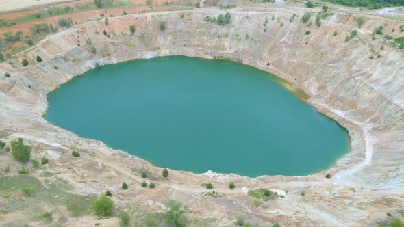 Quarry Open Copper Pit Mine Filled with Blue Water in Bulgaria, Top View