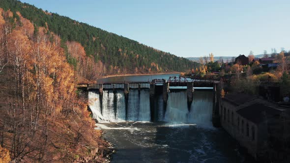 Aerial view; camera moving forward over the river rapids