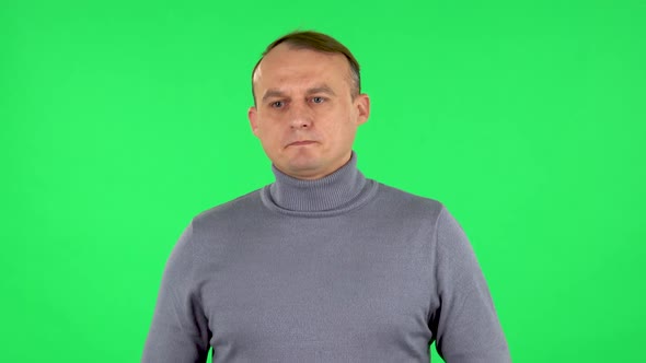 Portrait of Male Is Refusing Stress and Taking Situation. Green Screen