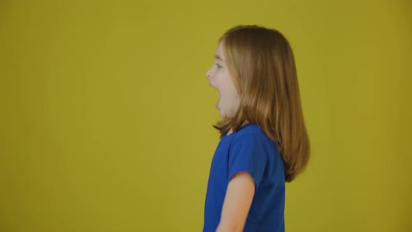 Side View of a Child Shouting Loud