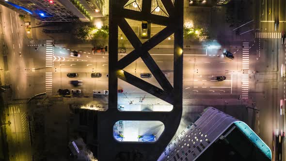 Top Down Ascending Footage of Traffic on Roads in Night City