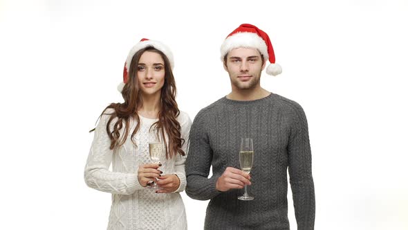 Slow-motion Young Couple Enjoy Drinking Champagne Celebrate for Christmas Fun Together Feeling