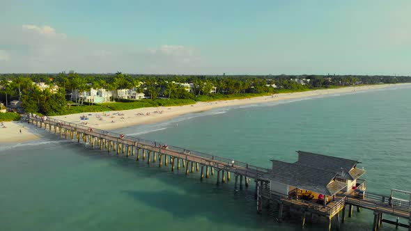 Coast and Beach Near Pier Leaving Into the Ocean