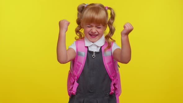 Cheerful Schoolgirl Raising Fists in Gesture I Did It Celebrating Success Winning Goal Achievemen