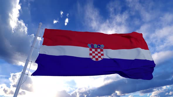 Realistic Flag of Croatia Waving at Wind in Slow with Blue Sky