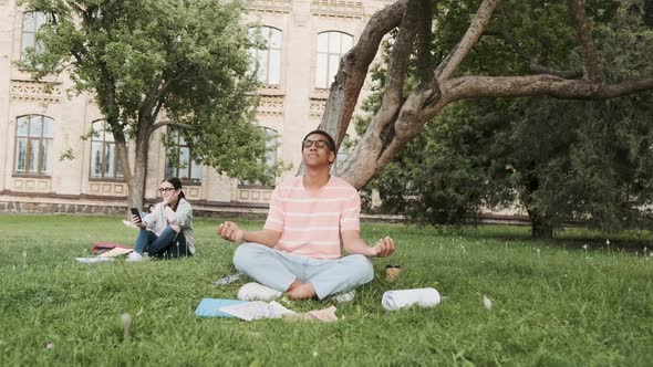 Meditation and Relaxation Outdoor in the Campus