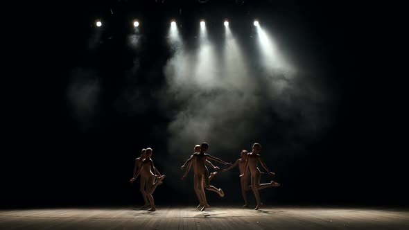 Little Cute Girls Dancing Ballet on Theater Stage on Black Background in Smoke