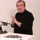 Man Shows a Master Class on Sharpening a Knife on a Machine - VideoHive Item for Sale