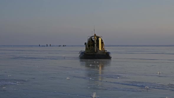 Hovercraft on Frozen Ice Surface of Baikal Lake