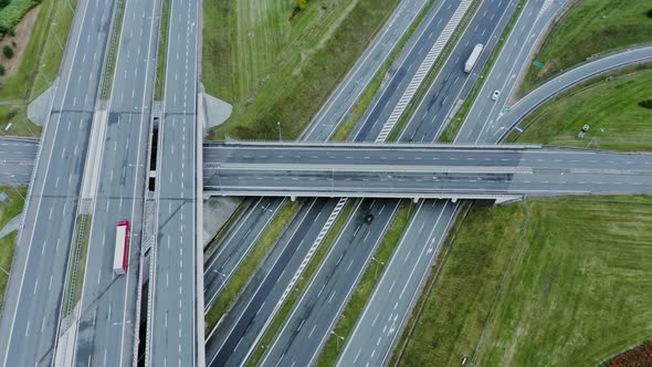 Video Filming From a Drone View of the Road Junction with Cars Moving Along It