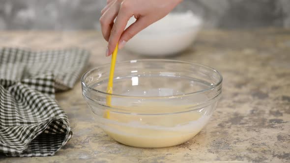 Pastry Chef Making Vanilla Mousse in the Kitchen.