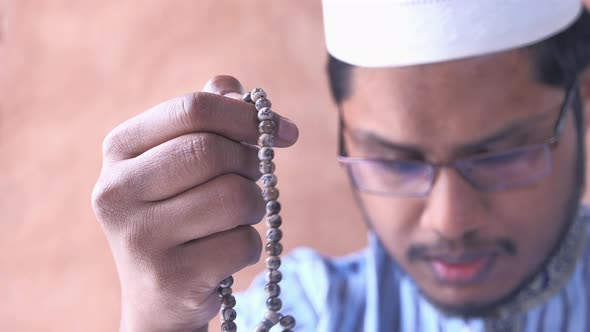 Close Up of Muslim Man Praying During Ramadan,  alt