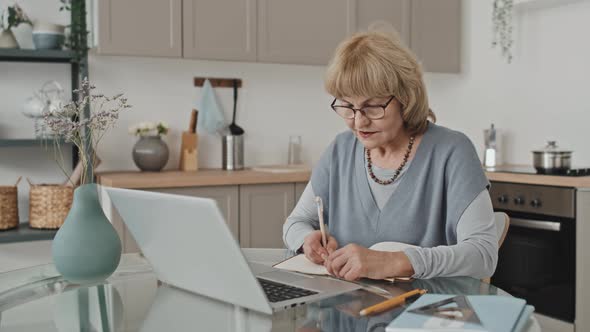 Senior Woman Taking Online Lesson at Home