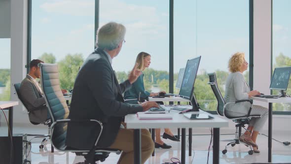 Various colleagues sitting in one room