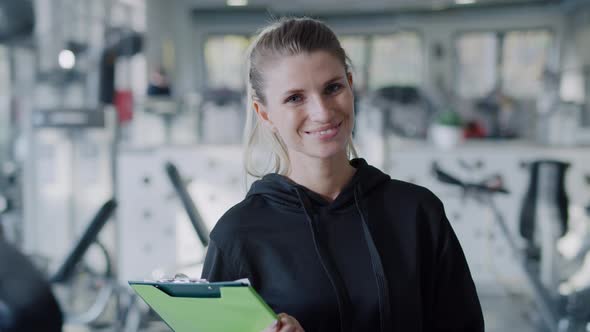 Portrait of female fitness instructor at the gym.  Shot with RED helium camera in 8K