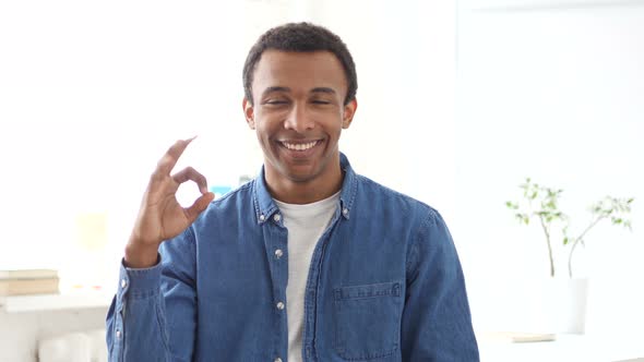 Okay Sign by Young Afro-American Man, Portrait