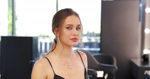 Portrait of a Young Woman in an Evening Dress