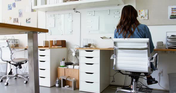 Female executive working at desk