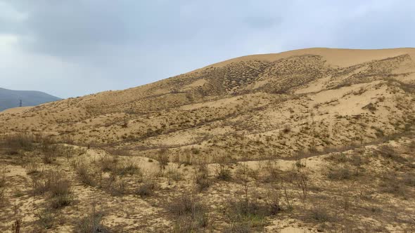 A Unique Sandy Mountain in the Caucasus on a Cloudy Day