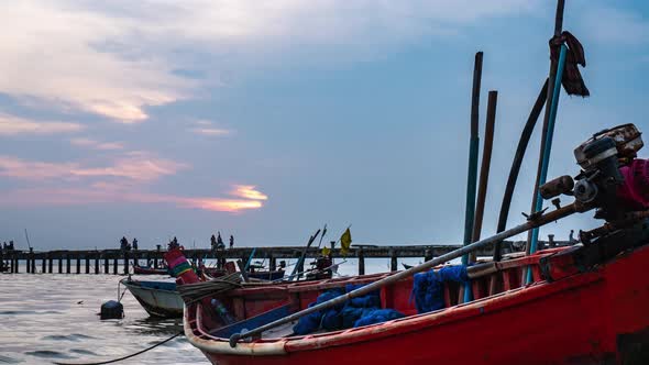 time-lapse of local fishing boat on tropical beach sunset, Thailand : 4k