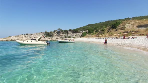 Boat parked next to beach in Albania