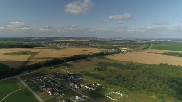 Panorama of villages among the fields of meadows and forests 05