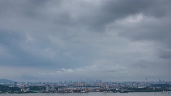 Time lapse of yangtze river skyline in nanjing city,china ,cloudy day