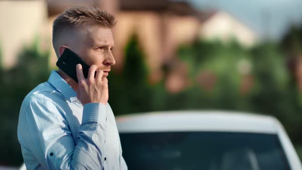 Stylish Busy Young Businessman Discussing Work Talking Using Smartphone Medium Closeup