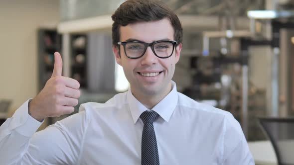 Thumbs Up By Businessman