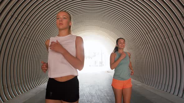 Young Women or Female Friends Running Outdoors