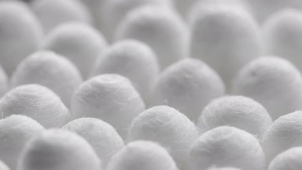 Closeup Spinning Fullframe Macro Background of Cotton Earbud Heads