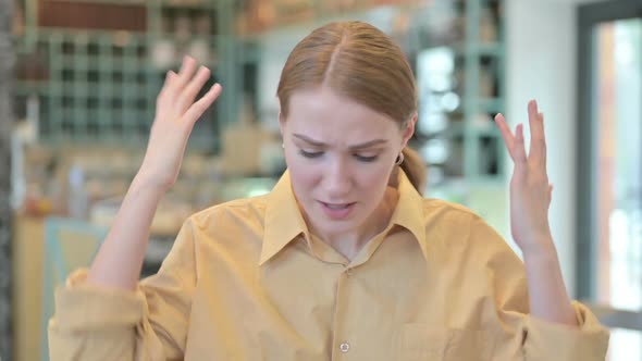 Portrait of Angry Young Woman Arguing Fight