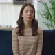 Confident Smiling Young Adult European Woman Looking at Camera Sitting on Sofa at Home Office - VideoHive Item for Sale