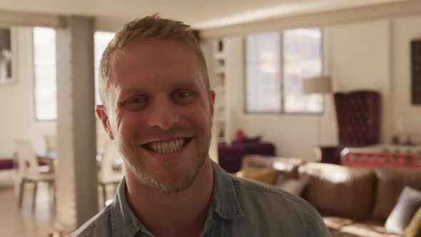 Caucasian male in social distancing looking at camera