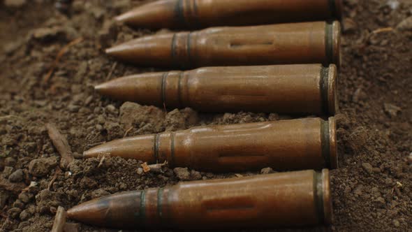 Pile of Old Cartridges for Automatic Weapons Closeup