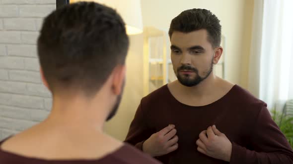 Unconfident Man Looking in Mirror Trying on New Cloth, Appearance Insecurities