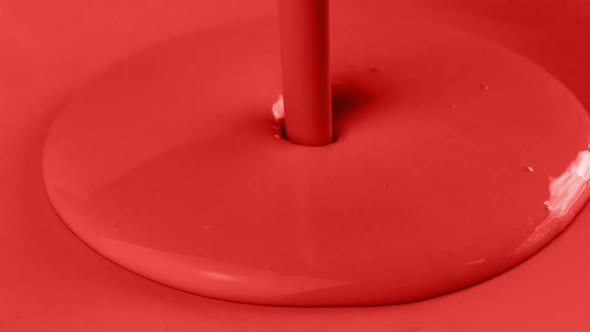 Red Paint Pouring On Red Surface