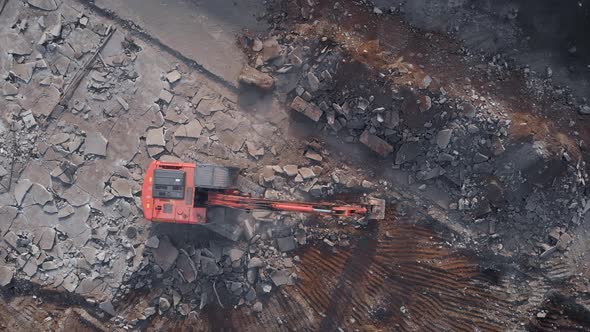 Air View. Demolition Work Is Carried Out with the Help of an Excavator. Heavy Machinery