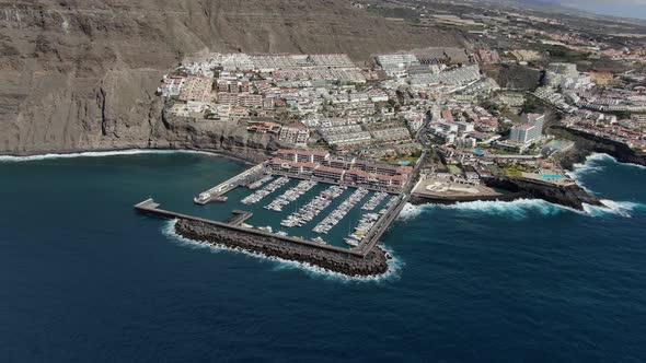 Drone over Los Gigantes coastal town in Tenerife, Canary Islands, Spain